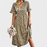 Fátima - Cvečni Oblek" can be rewritten as "Fátima - Floral Dress.