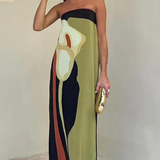 "Paula - Elegantna obleka z izrezom" can be rewritten as "Paula - Šik obleka z izrezom".
