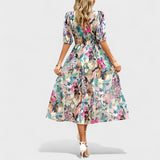 Clara - Elegantna Midi Cvetna Obleka